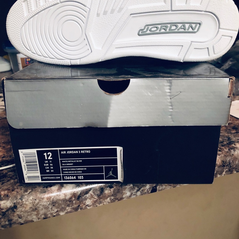 All white Jordan Retro 3